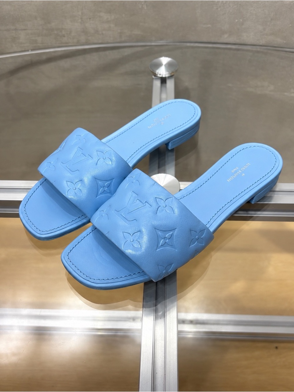 Louis Vuitton Light Blue Embossed Monogram Slide Mules